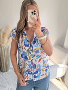 Chemisier femme imprimé fleuri coloré manches courtes avec boutons style chic été