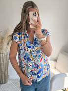 Chemisier femme imprimé fleuri coloré manches courtes avec boutons style chic été