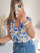 Chemisier femme imprimé fleuri coloré manches courtes avec boutons style chic été