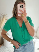 Blouse verte détail dentelle