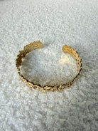 Bracelet doré à fleurs