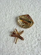 Pinces à cheveux dorés