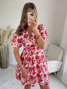 Robe Angy fleurie rose et rouge cache-cœur courte avec taille marquée et manches fluides, du S au 4XL, idéale pour été et cérémonie