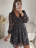 Robe courte noire dorée à manches longues Paris