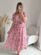 Robe longue rose imprimée bohème Giulietta avec manches fluides et décolleté cache-cœur du S au 4XL.