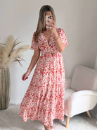 Robe longue fleurie rose Lyséa avec dos ouvert, manches fluides et coupe bohème chic du S au 4XL.