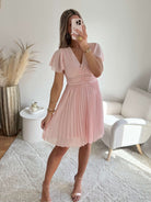 Robe plissée rose pâle - Louane