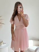 Robe plissée rose pâle - Louane