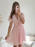 Robe plissée rose pâle - Louane