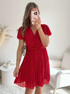 Robe plissée rouge - Louane