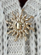Broche dorée